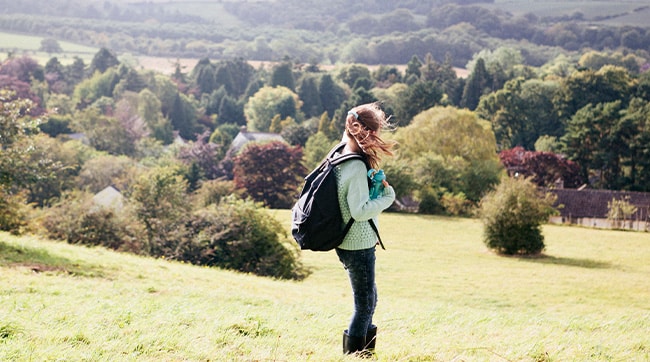 Woman walking through Kidlington countryside in Oxfordshire