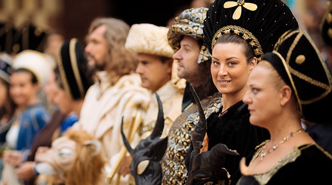 Several people dressed in Medieval clothing