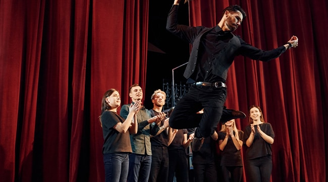 a theatre stage with performers