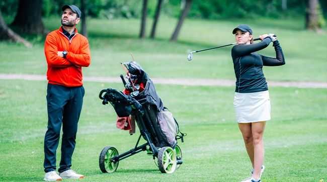 2 people on golf course at Witney, Oxfordshire